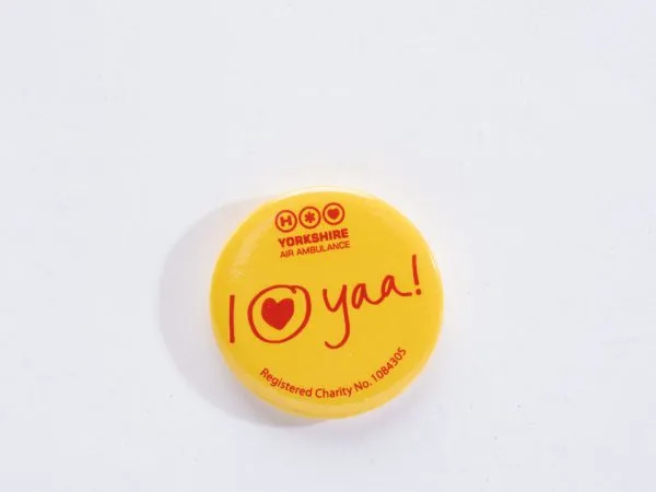 YAA Yellow Button Badge