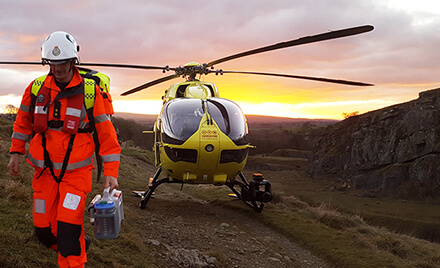 helicopter with sunset