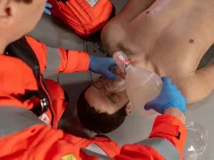 Image of YAA Crew training with life-like training manikin