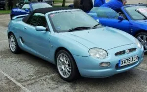 Photo of light blue convertible MG car