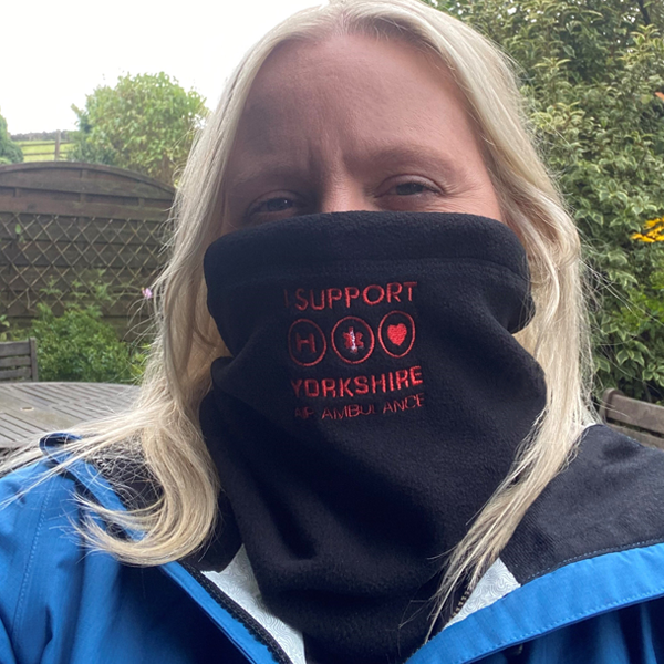 Person wearing Yorkshire Air Ambulance Snood
