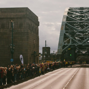 Supporters on either side of the Tyne Bridge, to cheer on runners in the Great North Run