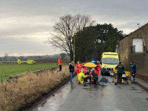 Scene of a bike accident with emergency services 