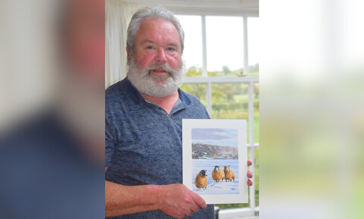A man with white hair and a beard and moustache is stook in front of a window holding a framed painting which features three sheep.