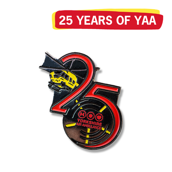 An image of a pin badge with a graphic which says '25 YEARS OF YAA'